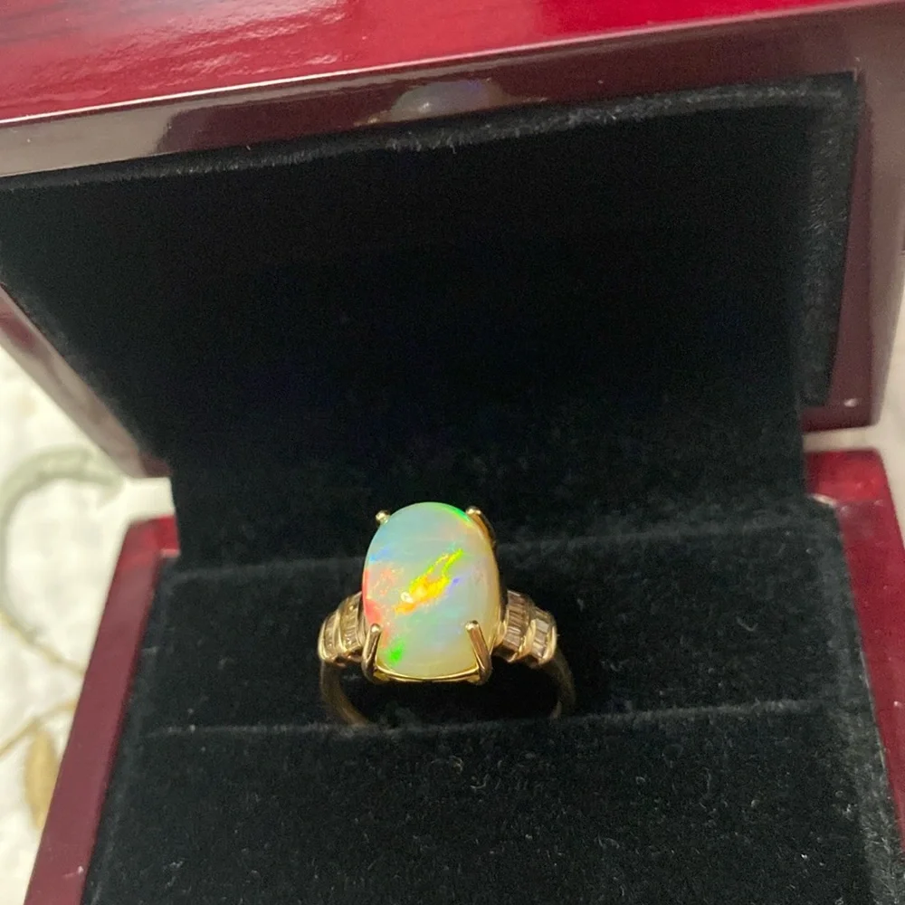 AAA Ethiopian Welo 7.56 cwt Opal and G-H SI Diamond Ring in 10 k gold size 7